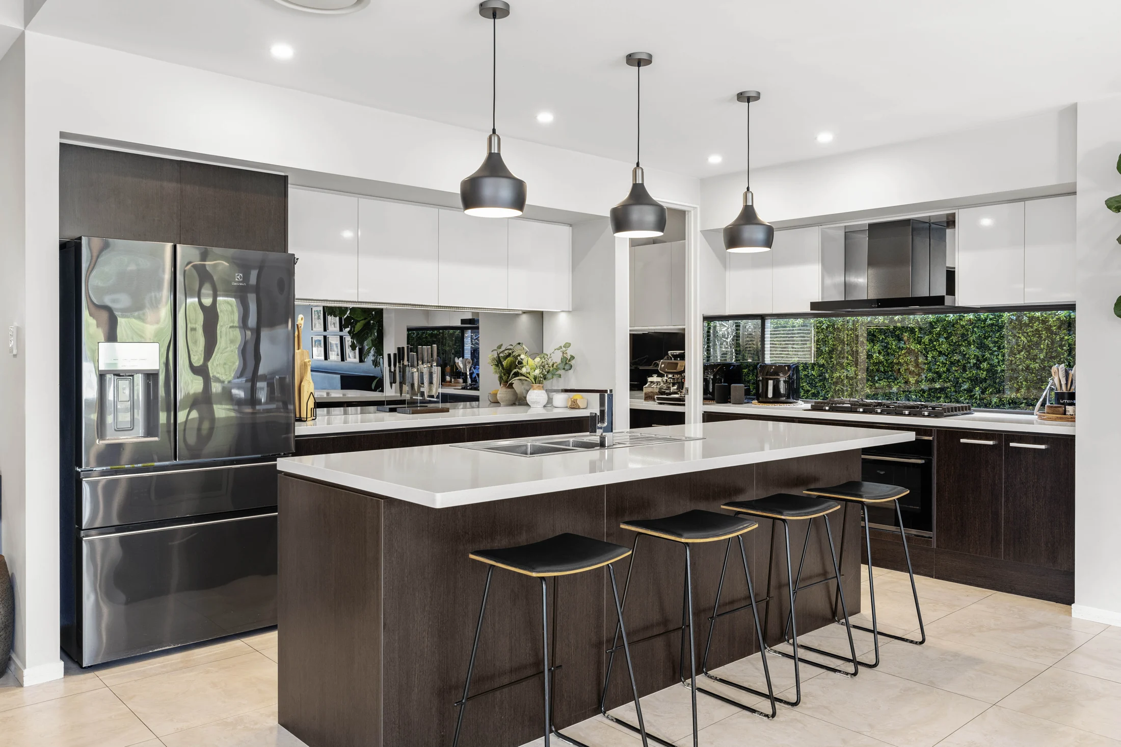 Caesarstone island kitchen with pendant lighting